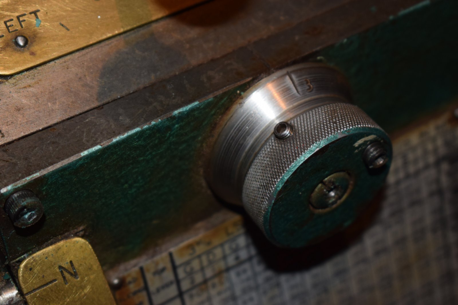 Hi me again (not so smart Art LOL) After trying to get my head round the different feed setting. following the directions in the denford Manual my selector dial stopped turning and is now stuck I have released the two grub screws and the centre slotted nut but it wont budge. I think something inside the gearbox is jamming. My Q. is how to take off the front plate of the G Box and is this feasible. Any help welcomed